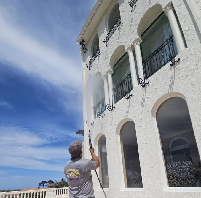 Klean Kingdom owner soft-washing the rendered exterior facade of Alcooringa, Bellevue Hill, ahead of its $80 million sale Hands-on soft-wash exterior house wash cleaning the rendered facade ahead of a sale that saw the property resell for $80 million at Alcooringa, Bellevue Hill